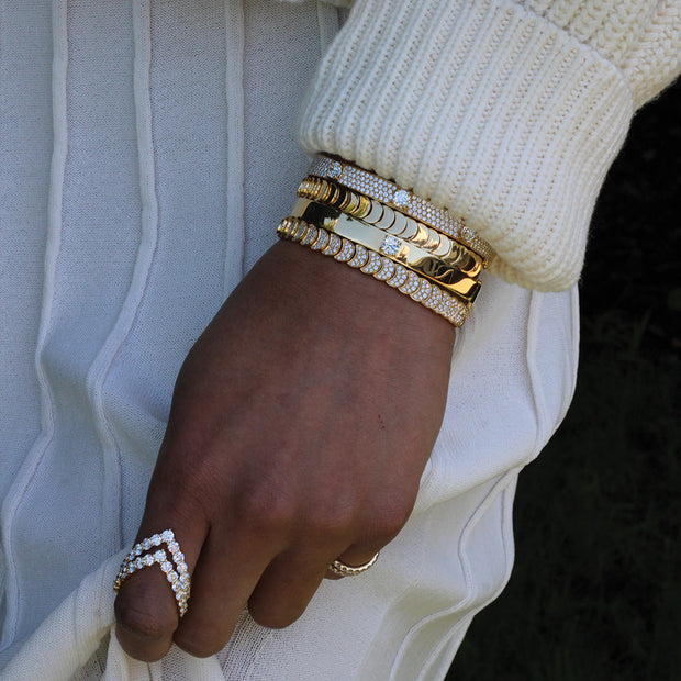 PAVE OVAL BRACELET WITH THREE ROUND DIAMONDS