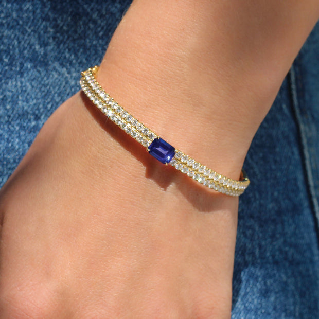 GIA DIAMOND BRACELET WITH EMERALD CUT BLUE SAPPHIRE CENTER