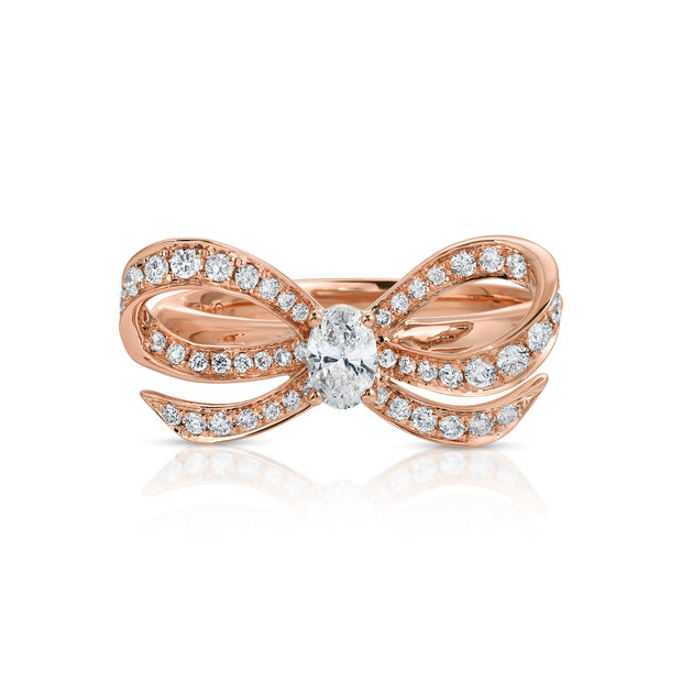DIAMOND BOW RING WITH OVAL DIAMOND CENTER