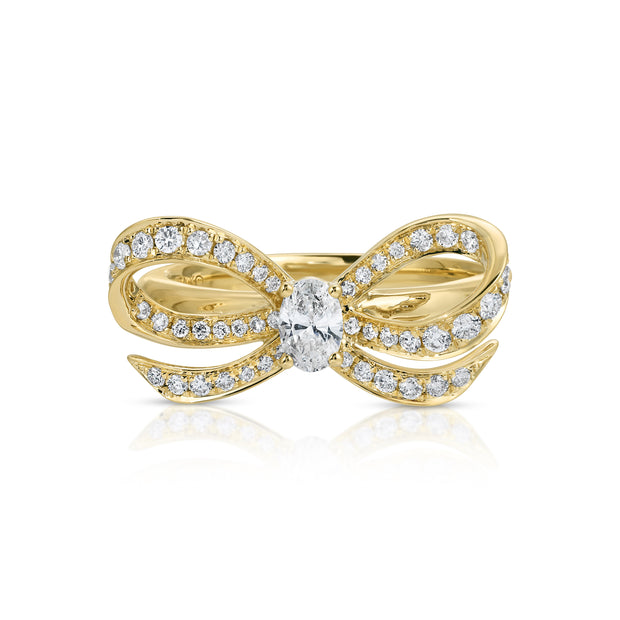 DIAMOND BOW RING WITH OVAL DIAMOND CENTER