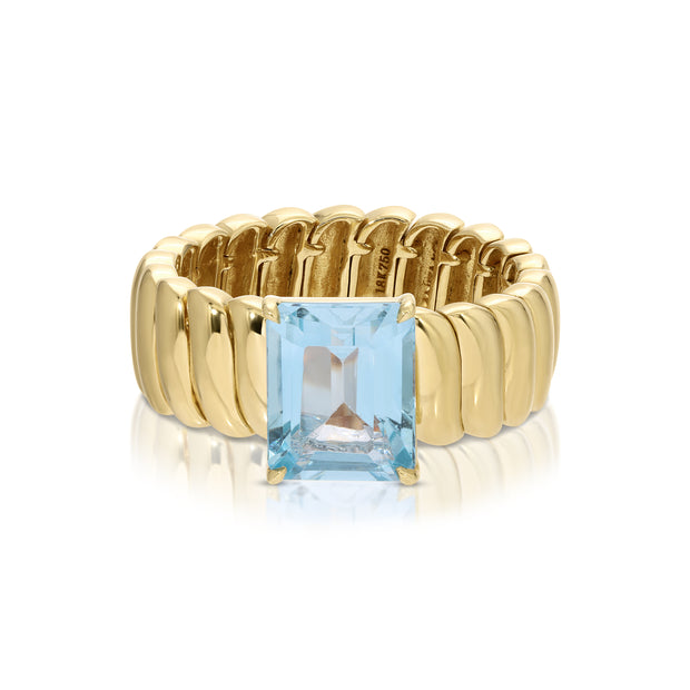 ZOE RING WITH BLUE TOPAZ EMERALD CUT CENTER