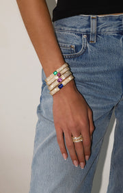 PAVE DIAMOND OVAL BRACELET WITH OVAL PINK SAPPHIRE CUSHION CENTER