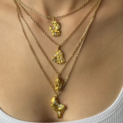 22K YELLOW GOLD NUGGET WITH THREE DIAMONDS