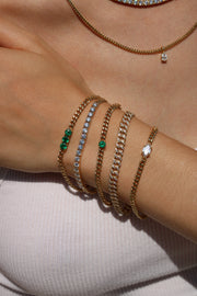 SMALL CUBAN CHAIN LINK BRACELET WITH ROUND EMERALD CENTER