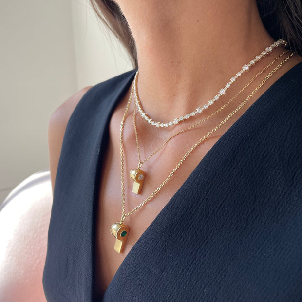 GOLD AND ROUND DIAMOND BABY WHISTLE