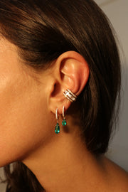 SINGLE DIAMOND HUGGIE WITH PEAR-SHAPED EMERALD DROP