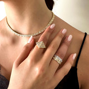 BEZELED TRILLION DIAMOND RING