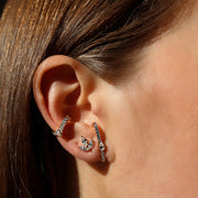 CURVED DIAMOND EAR CUFF WITH PEAR DIAMOND CENTER