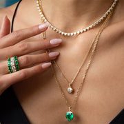 EMERALD CUT EMERALD HALF BAND