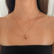 GOLD AND PINK SAPPHIRE BABY WHISTLE