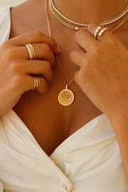 CLASSIC ZODIAC COIN PENDANT