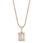 BEZELED EMERALD CUT DIAMOND PENDANT