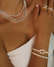 PAVE GIA BANGLE WITH EMERALD CUT DIAMOND CENTER