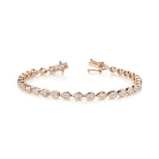 PEAR DIAMOND BEZEL TENNIS BRACELET