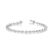 PEAR DIAMOND BEZEL TENNIS BRACELET