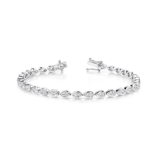 PEAR DIAMOND BEZEL TENNIS BRACELET