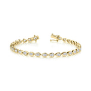 PEAR DIAMOND BEZEL TENNIS BRACELET